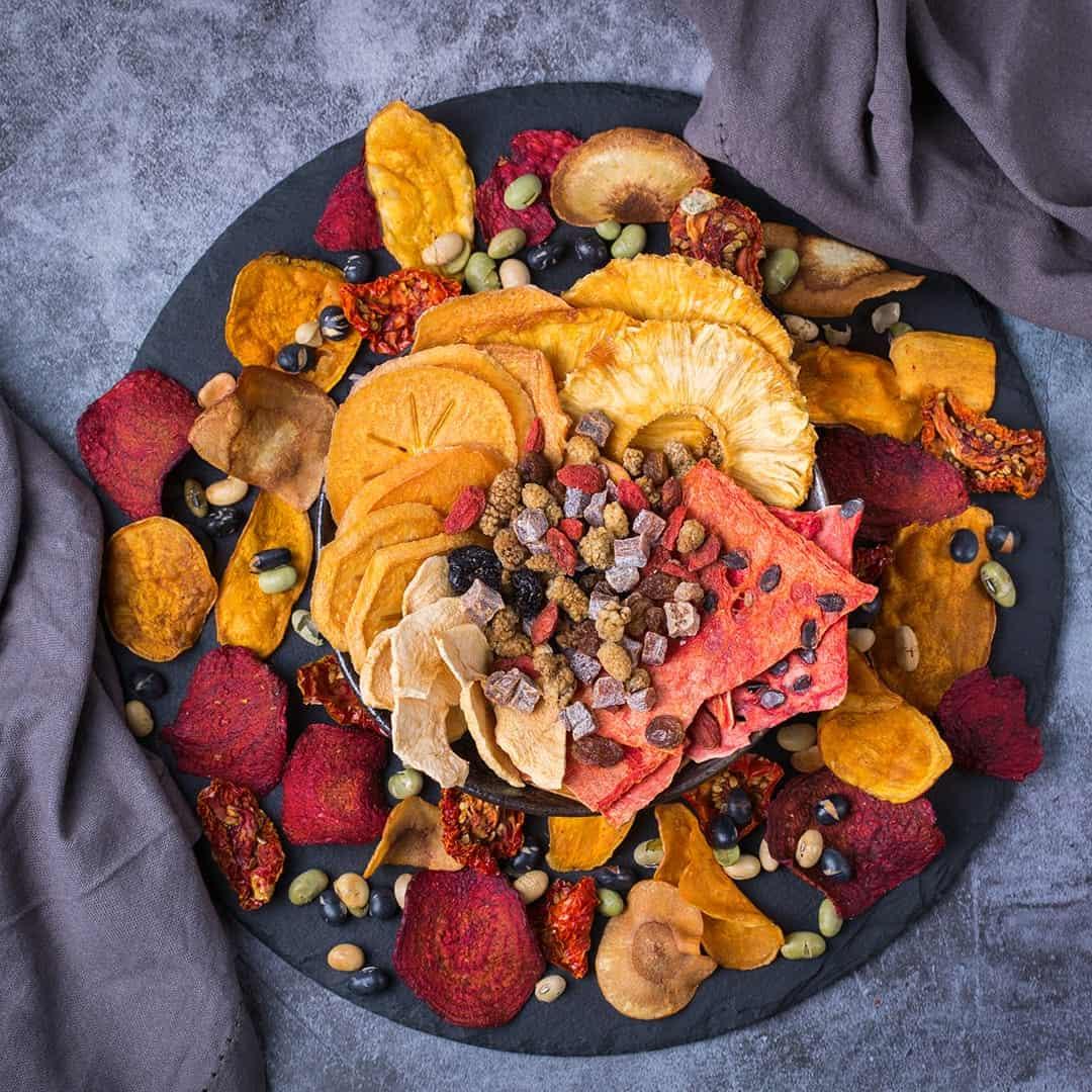 A Plate Of Assorted Dried Fruits And Nuts